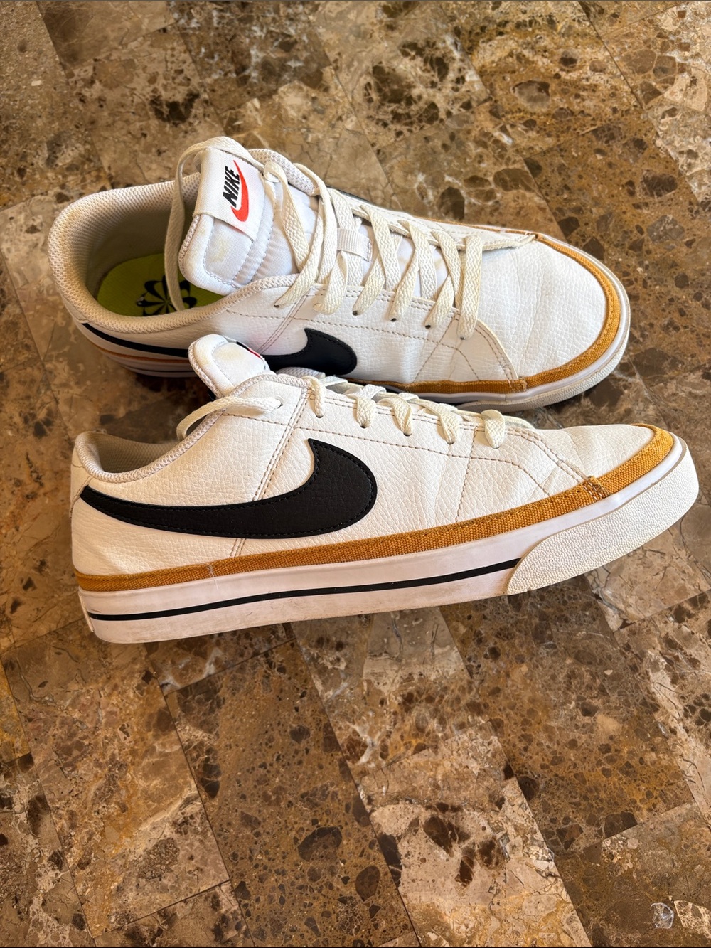 Nike Men’s White Sneakers with Black Swoosh and Gold Trim